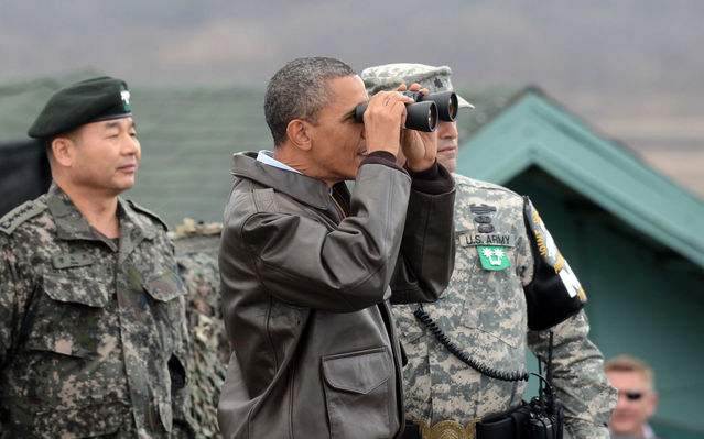 Obama at the DMZ prior to the March 2012 Seoul Summit, where he warned North Koreaas part of US imperialist war drive in East Asia (Pool/Yonhap News via Bloomberg)